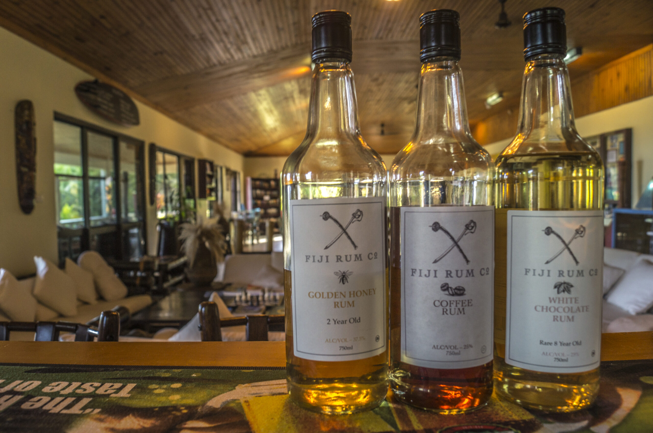 Bottles of Fijian rum on the Waidroka Bay Resort bar