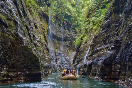 People rafting down a river in Fiji