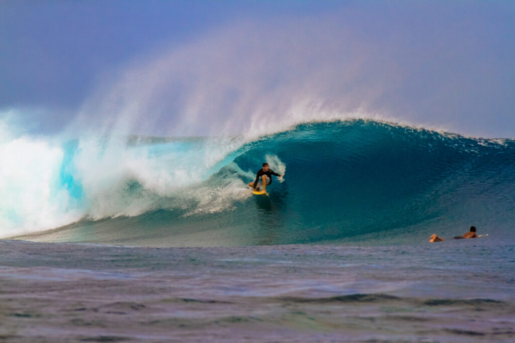 Surfer in barrel at Frigates break