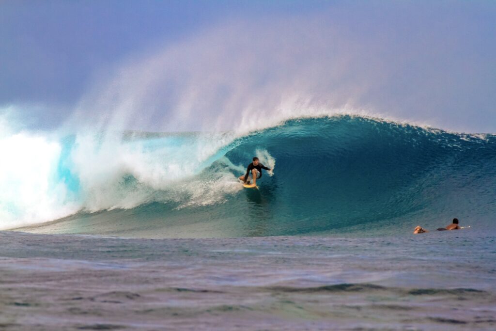 Surfing the left barrel at Frigates Passage