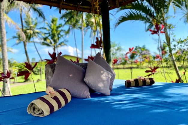 Poolside daybed at Waidroka Bay Resort