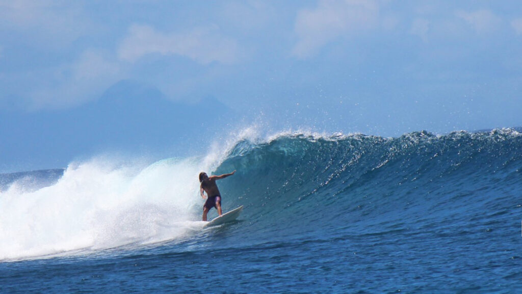 Surfer on left at Resort's break