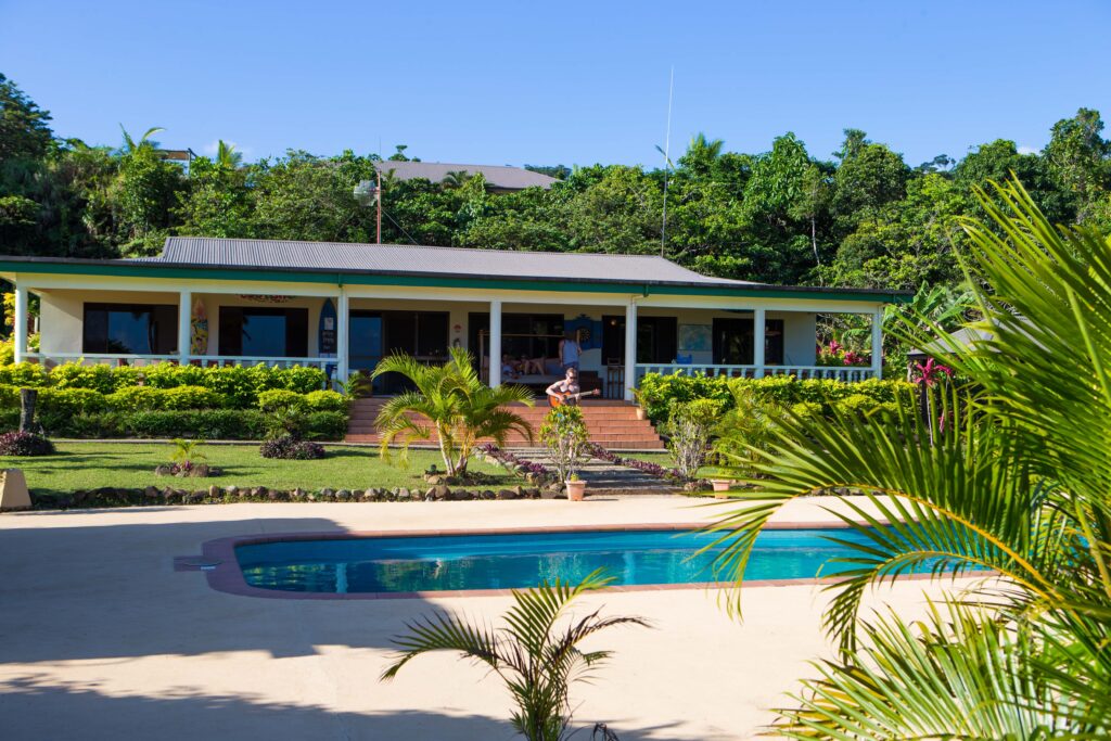 Main building and pool area at Waidroka Bay Resort