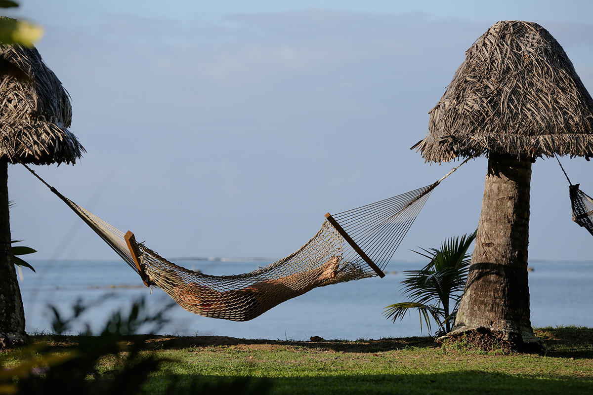 relaxing in a hammock by the bay