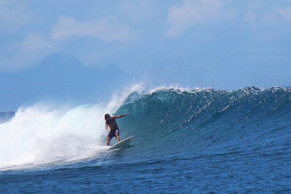 Surfer on left at Resort's break